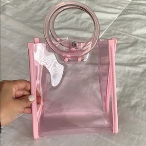 Cute clear hand bag.